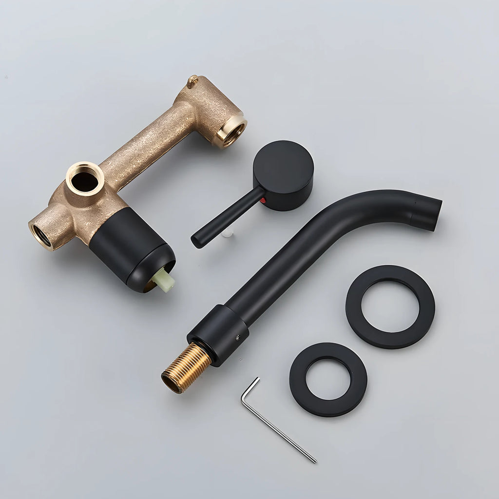 Kit du robinet encastrable noir mat déballé : corps de mélange en laiton, bec, manette, deux rosaces et clé de montage