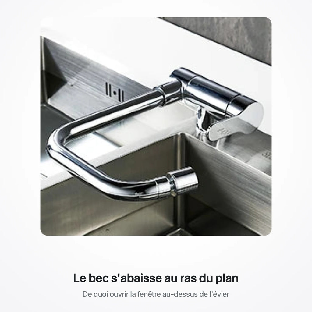 Bec du robinet abaissé au ras du plan de travail, au-dessus d'un évier en inox